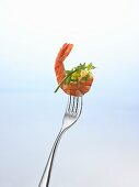 Prawn and herbs on a fork