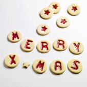 Jam biscuits spelling out MERRY XMAS