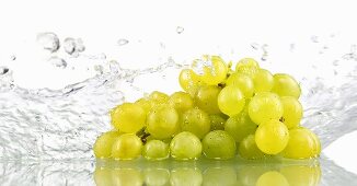 Green grapes being washed