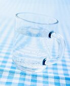 A glass mug of mineral water