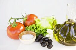 Fresh vegetables with salt and olive oil