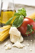 Tomato with spaghetti, Parmesan, basil and olive oil