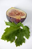 One half fig with leaf