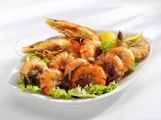 Shrimps with lettuce garnish in a dish