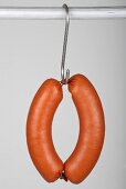 A ring bologna on a hook