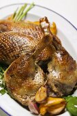 Roast goose pieces with garlic 