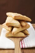 Triangular savoury puff pastry pasties, in a pile