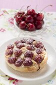 Cherry tart with icing sugar