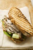 Grilled bread with turkey, cucumber and tomato
