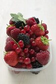 Fresh berries in plastic punnet