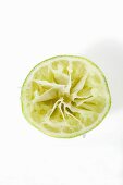 Half a lime, squeezed (overhead view)