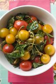 Tomato salad with capers and herbs (overhead view)