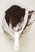 Cocoa powder in bag with scoop