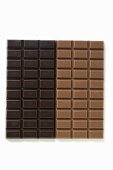 Two bars of chocolate: dark chocolate and milk chocolate