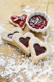 Heart-shaped biscuits filled with raspberry jam