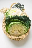Cauliflower and savoy cabbage in a basket