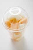 Fruit salad in a plastic beaker