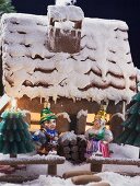 Gingerbread house with Christmas tree ornaments