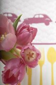 Vase of pink tulips from above