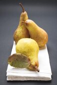 Three pears on cloth