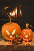 Two pumpkin lanterns, place card & candy corn for Halloween