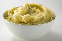 Mashed potato in white bowl