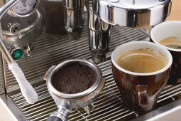 Two cups of espresso on espresso machine