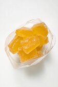 Candied pineapple chunks in plastic bag