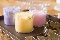 Coloured sugar for decorating biscuits, biscuit cutters