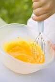 Whisking egg yolks