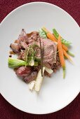 Roast beef on vegetables