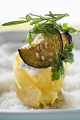 Baked potato with aubergine and deep-fried herbs