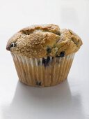 Blueberry muffin in paper case