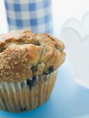 Blueberry muffin in paper case