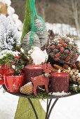 Christmas decorations on table out of doors