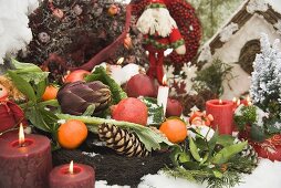 Christmas decorations in snowy garden (detail)