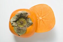 Persimmon, cut in half (overhead view)