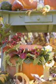 Autumnal garden decoration with pumpkins