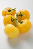 Five yellow cherry tomatoes