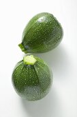 Two round courgettes