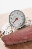 Sirloin strip steak with meat thermometer