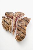 Grilled T-bone steak, cut into pieces