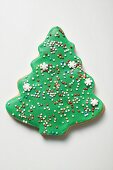 Christmas tree biscuit decorated with hundreds & thousands