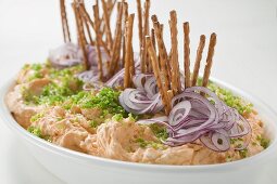 Obatzda (cheese spread) with onions, chives, salted sticks