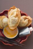 Deep-fried dim sum with two sauces (Asia)