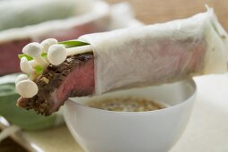 Rice paper rolls filled with beef & mushrooms, sesame sauce