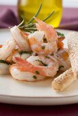 Fried prawns with rosemary and sesame grissini