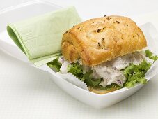 Chicken salad sandwich in polystyrene container