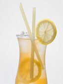 Iced tea with lemon slices and straws
