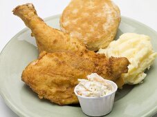 Fried chicken with mashed potato, coleslaw and scone